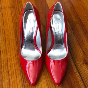 Red pumps with colorful heel